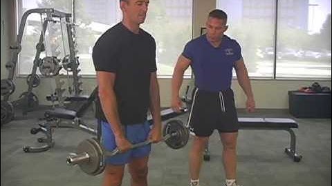 Standing Upright Row with a Curl Bar in 2 Options