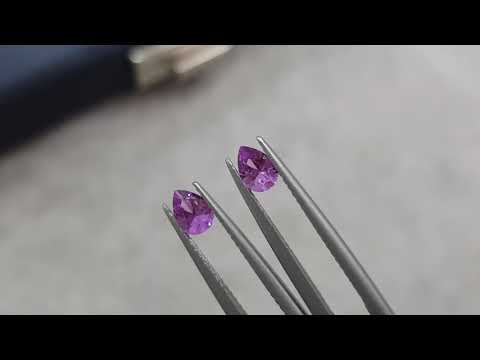 Pair of purple unheated pear cut sapphires 0.76 ct Video  № 2