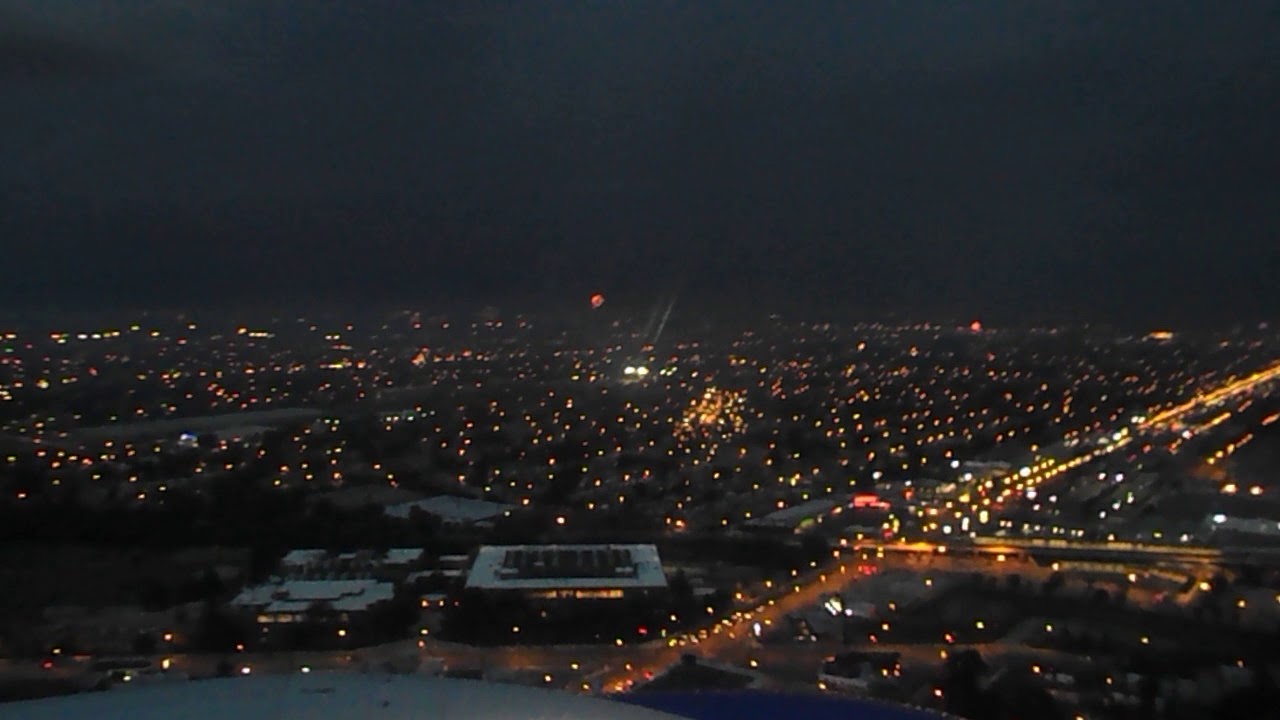 Firework nearly misses plane on approach to Chicago Midway. Fireworks, lighting, & landing included.