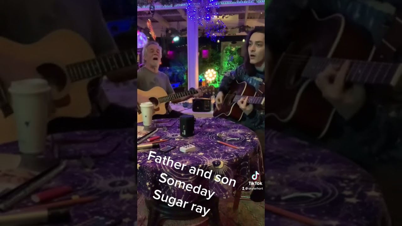 My dad and I playing someday on the deck 