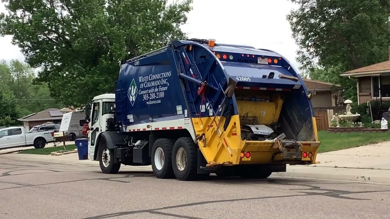waste connections new Mack lr mcneillus rear loader on trash