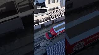 Cars Drive Through Sea Foam In New Hampshire