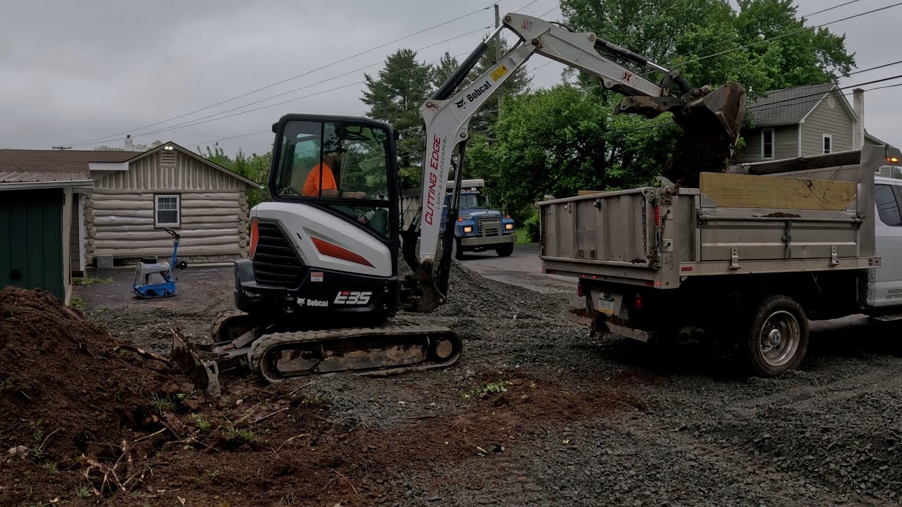 Bobcat e35 extending a parking area.