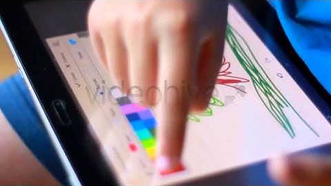 Stock Footage - Drawing With Finger Touchscreen iPad | VideoHive