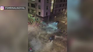 Spectator appears to be struck by car in San Francisco sideshow video