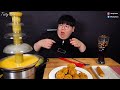 YouTuber conquers cheese fondue fountain in heartwarming sequel