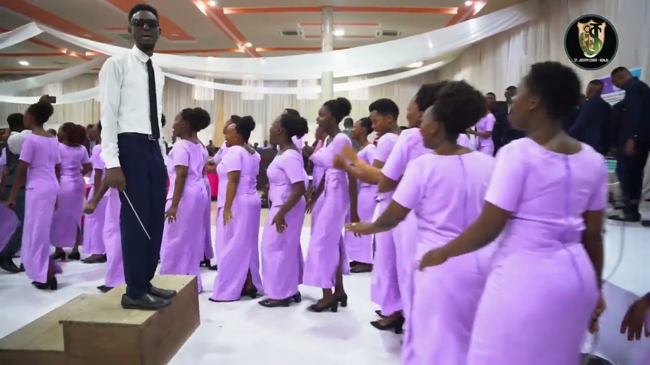 KISHINDO CHA WAKOMA KIKAKUTANA NA KWAYA YA MTAKATIFU JOSEPH - BUNJU WAKAPITA NAYO