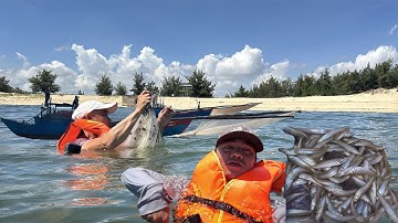 Vlog: Werpnetten voor makreel Anh Tien werpt netten uit in de middagzon - Sea People