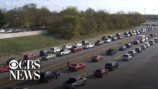 Thousands line up in cars in Texas to receive food before Thanksgiving