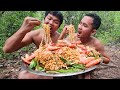 Yummy hot noodle w sea food eating in forest