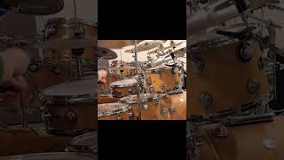 Drumming a soulful shuffle groove along a track