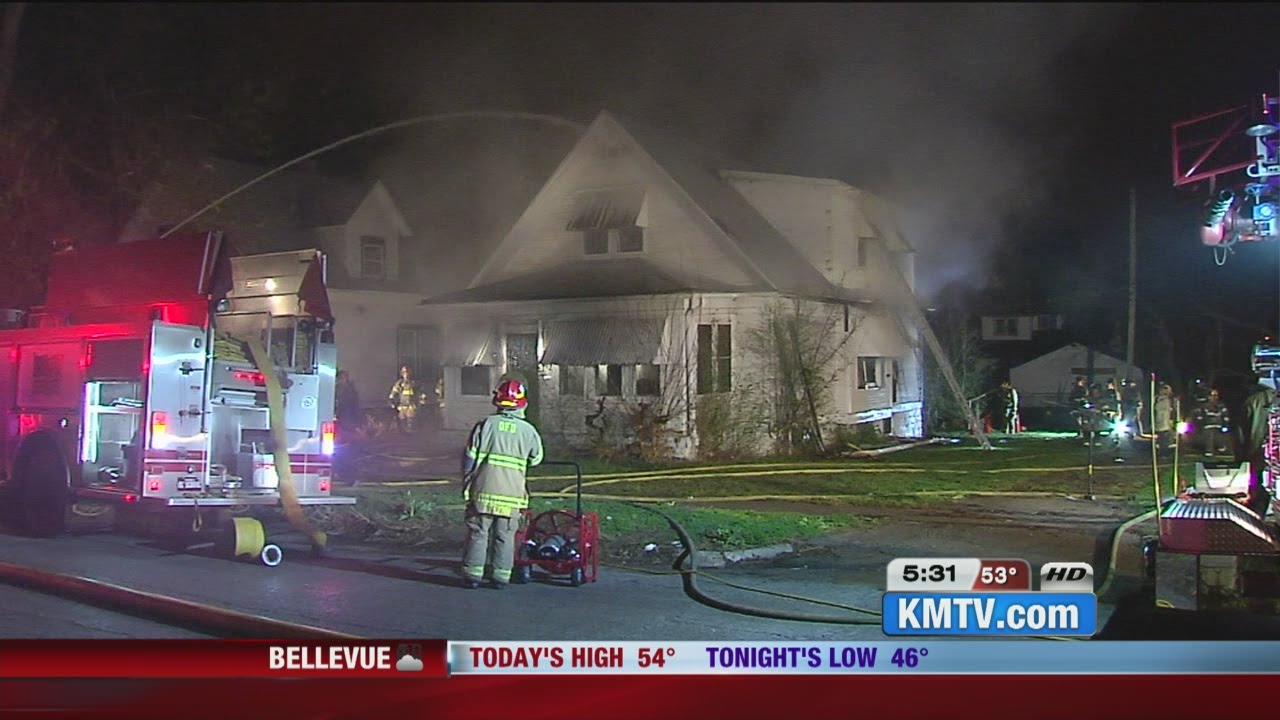 Firefighters battle abandoned house fire - YouTube