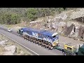 8650 Freight corp locomotive with 3 trucks working hard up the Moonbi range on the way to Dorrigo