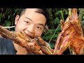 Primitive Skills: Wild chicken trap in the forest and delicious grilling