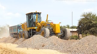 Great Motor Grader Operating Skills Pushing Gravel for the Village Road Foundation Construction