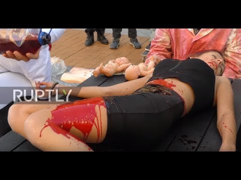Bulgaria: Vegan activists 'cook and eat' human in gripping street performance