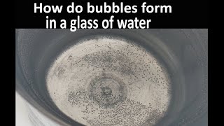 What are the small bubbles that form in a glass of water? - BBC