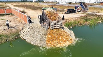 Launches Amazing Project Using MITSUBISHI Dozer to Push Stone Into Deep Water To create a new path.