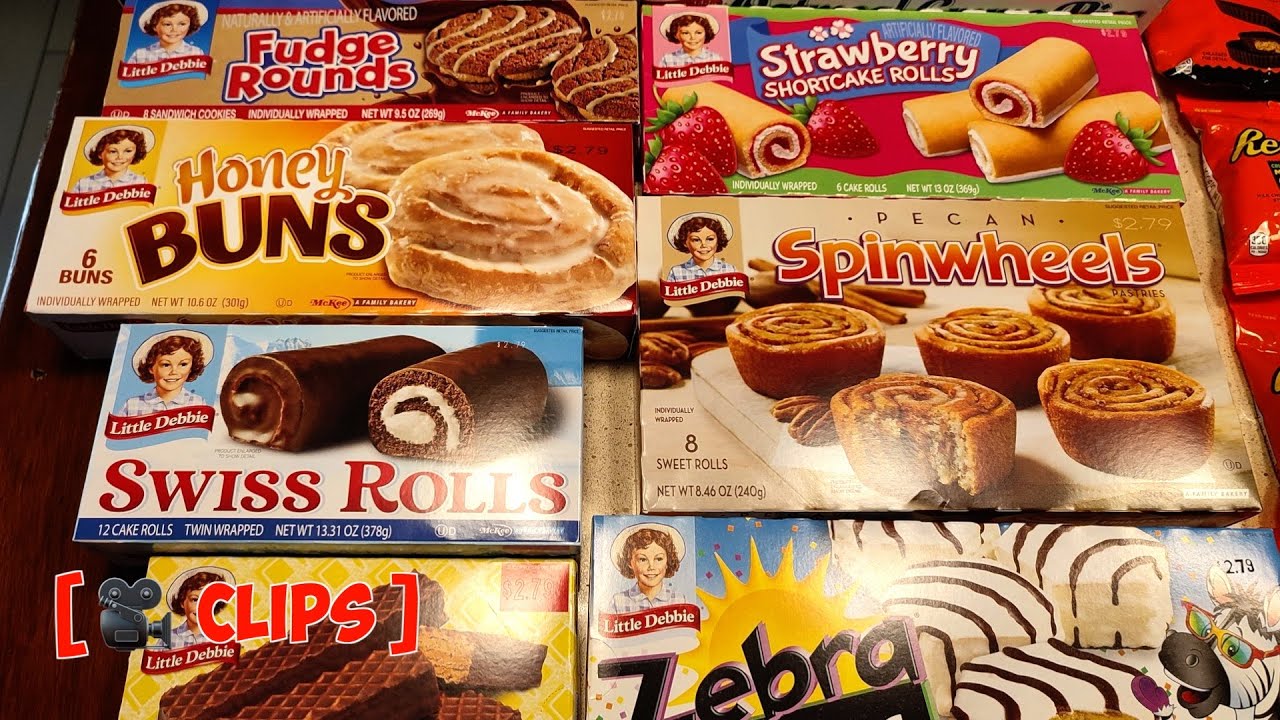 Taste Test: Brits Try Little Debbie Snacks for the First Time! 🇺🇸🍰 | Honey Buns, Zebra Cakes & More!