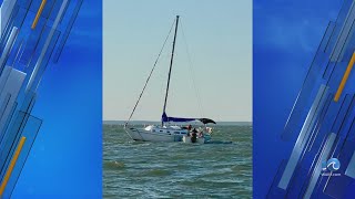 Two people and two dogs rescued from stuck vessel in Middlesex County