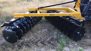 AMCO LOF Disc running in stump unbroken ground for food plots (1 of 4)