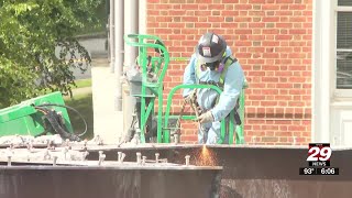 Fifty-year-old foot bridge comes down