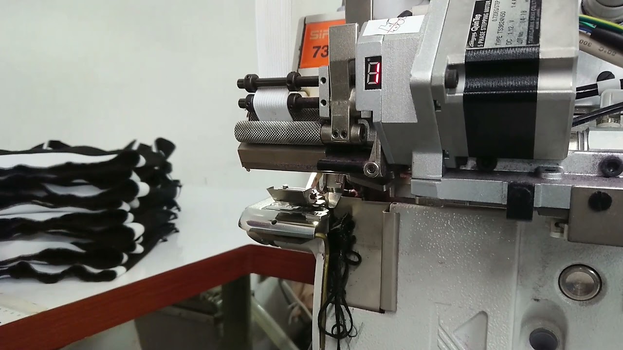 Máquina overlock, remalladora con alimentador de elástico automático Siruba