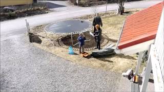 Setting up a trampoline.