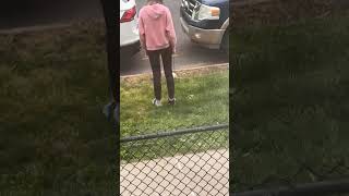 Three girl leash their pet rats and take them for a walk on grass lawn