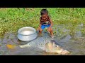 Really amazing hand fishing  traditional boy catching fish by hand in raining water