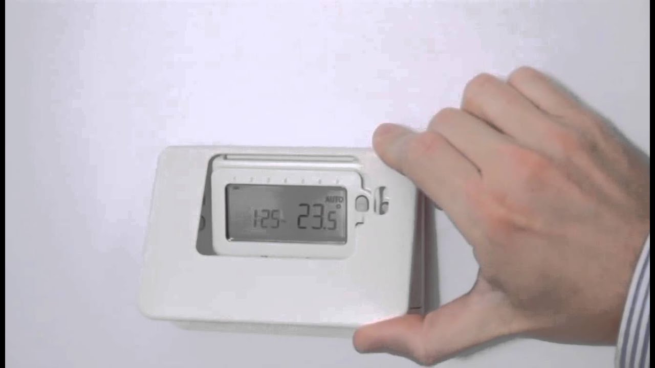 Video: Setting the Honeywell thermostat's time - YouTube