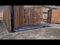 Bi-Fold Gate for Wide Driveway with Limited and Restricted Space - by The Motorised Gate Company