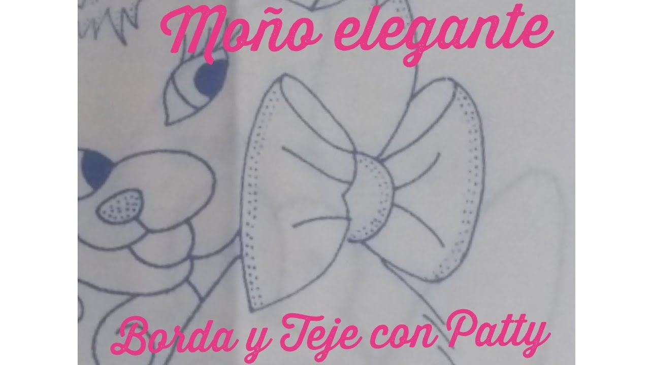 bordando el moño de la Gatita Marie