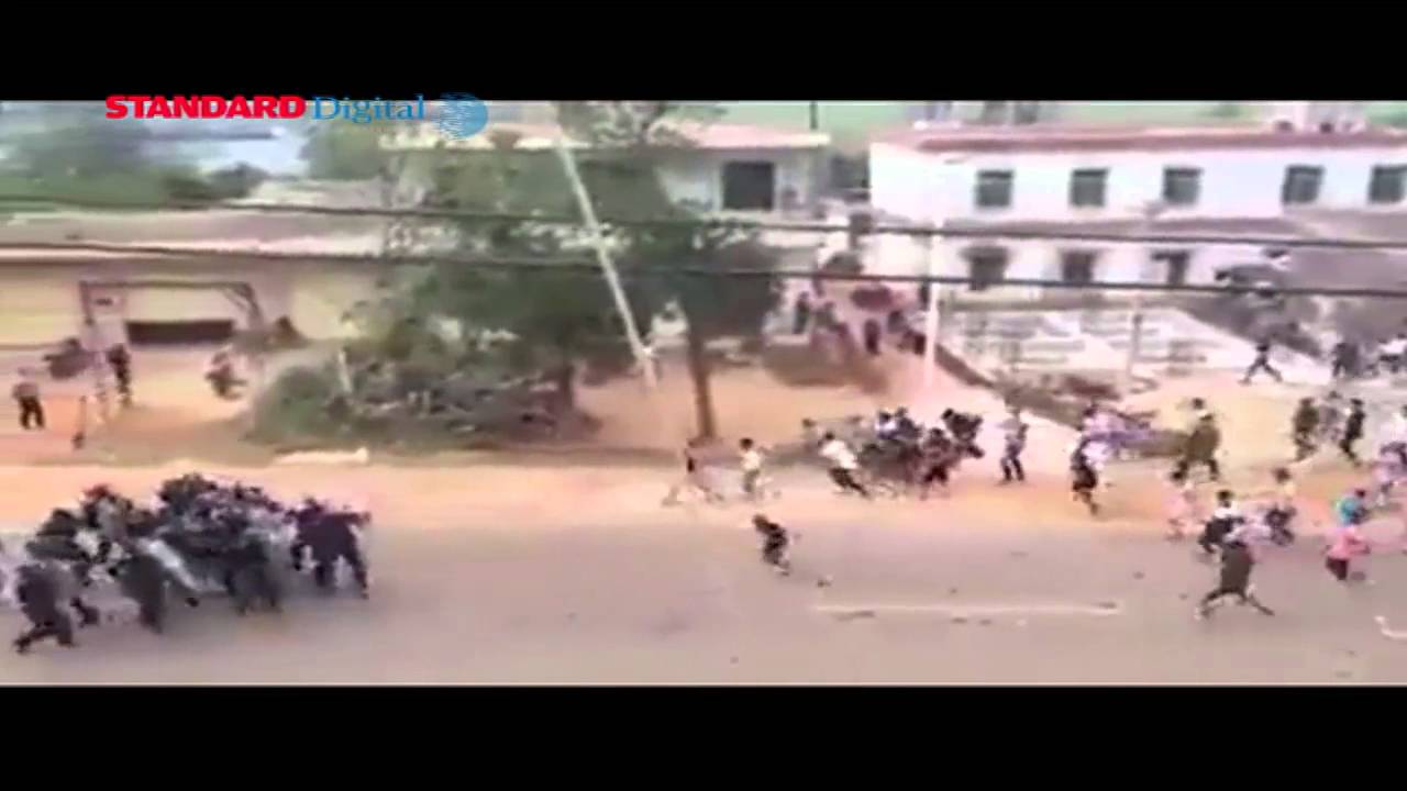 Ugandan police hit one protester but hell breaks loose minutes after a short argument