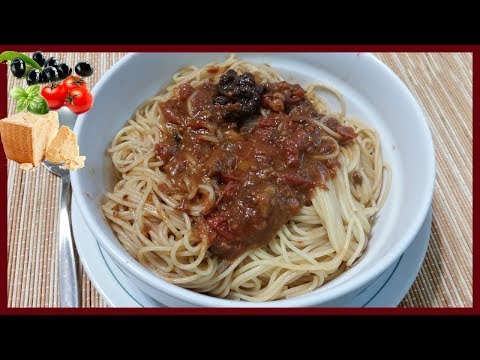 Spaghetti con patè di olive nere, pomodorini e scaglie di parmigiano - Le Ricette di Zio Roberto