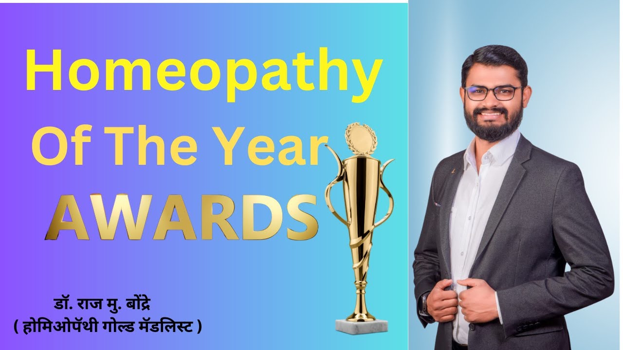 Dr. Raj Bondre receiving Homeopath of the Year award