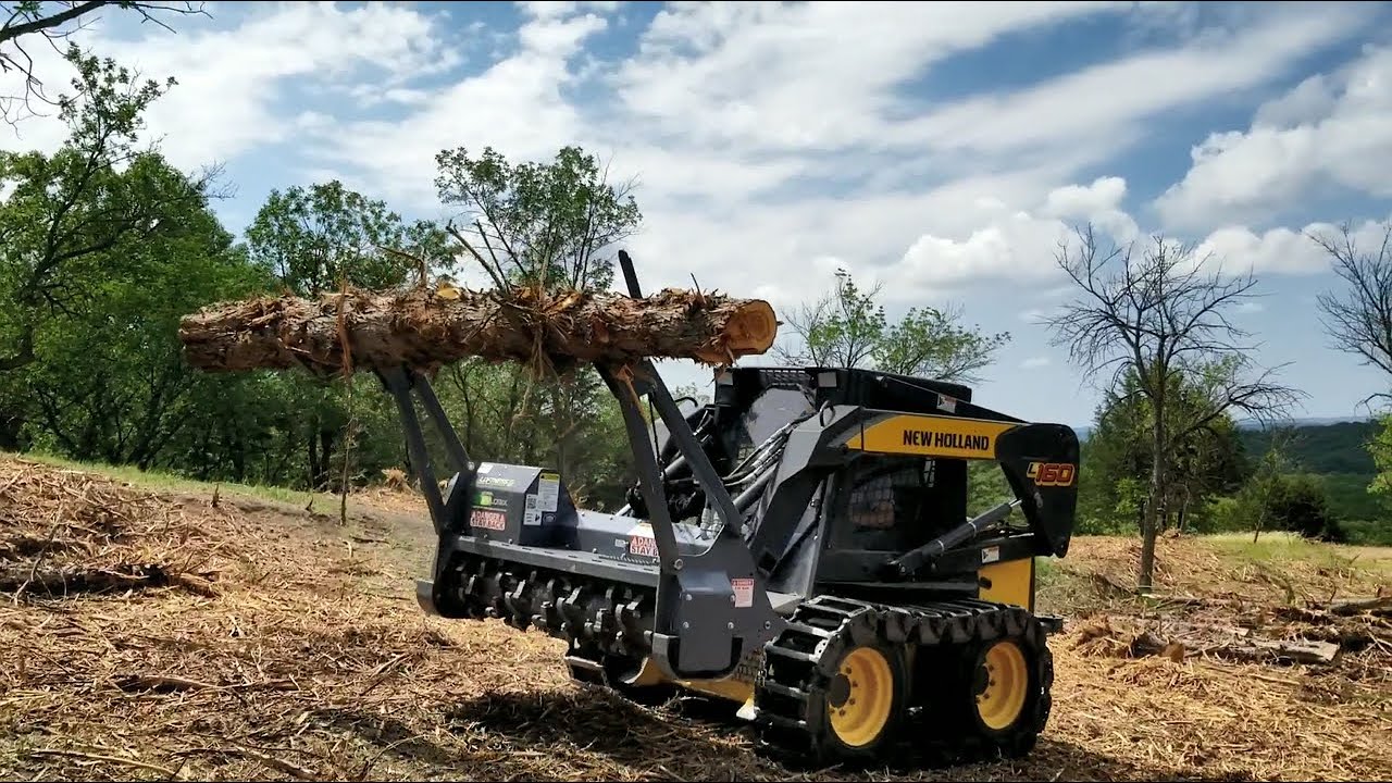 Log carrier attachment for Loftness Battle Ax Forestry Cutter / Mulcher YouTube