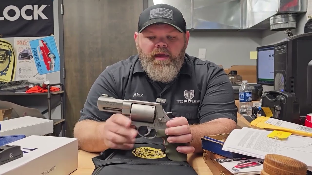 Guns on a messy desk. What will you find today?