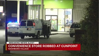 Convenience store robbed at gunpoint
