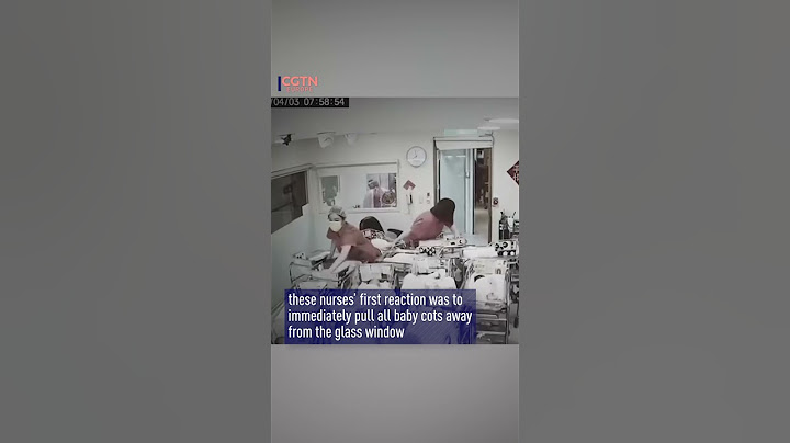 তাইওয়ানের ভূমিকম্পের সময় নার্সরা নবজাতক শিশুদের রক্ষা করছে