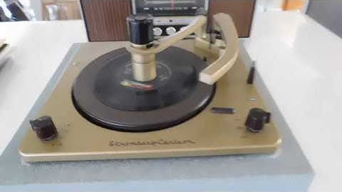 Stromberg  Carlson Voice of Music record changer playing a 45 record