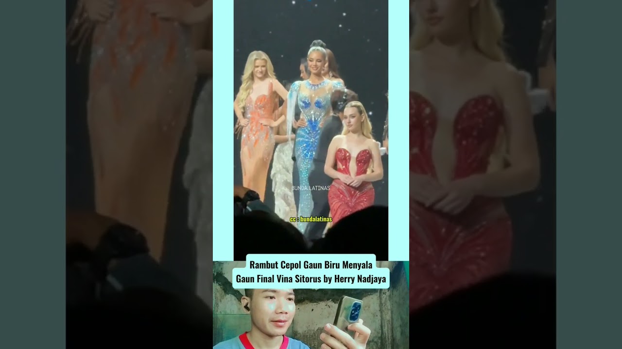 rambut dicepol dengan gaun biru menyala