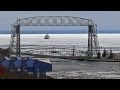 Biscayne Bay helps Mesabi Miner helps Quebecois and CSL Assiniboine