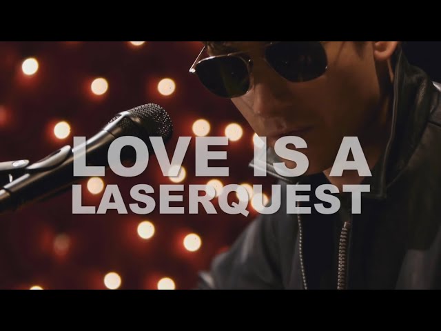 Arctic Monkeys - Love Is A Laserquest Lyrics class=