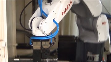 SH  40 CNC with Robot for load unload