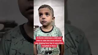 A Doctor In Gaza Tries To Calm Down A Child Shaking From Fear Due To Israeli Airstrikes