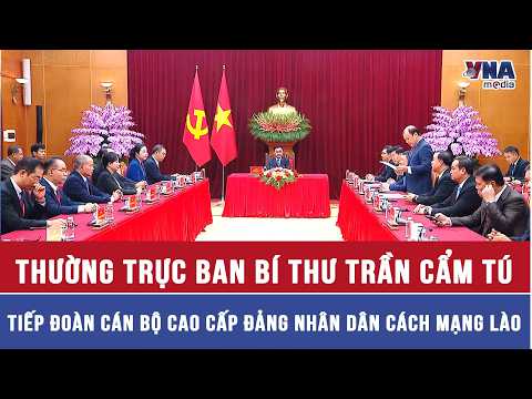 Permanent Member of the Party Central Committee Secretariat Tran Cam Tu meets with the high-level...
