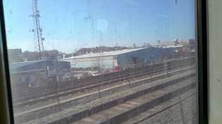 20150413 155202 MBTA Red Line train getting passed by Commuter Train