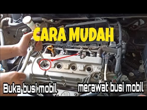 cara memasang busi motor honda beat memang sedikit sulit di samping letak busi yang tertutup juga lu. 