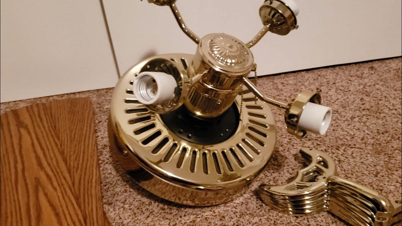 A Hunter "traditional" ceiling fan in polished brass. YouTube